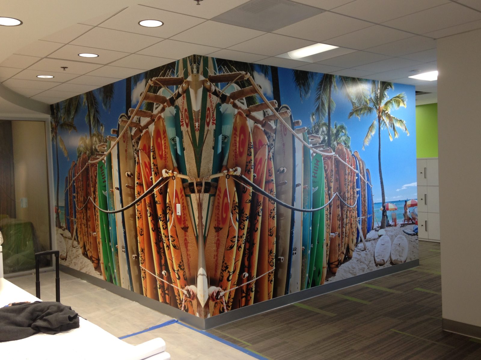 Surfboard beach wall mural wrapping an office corner